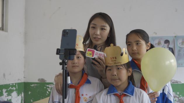 “情暖童心 心系马塔”花房集团爱心捐助“开学大礼包”